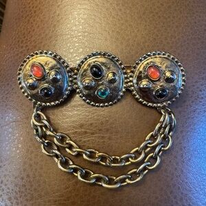 VTG gold tone chatelaine style brooch w/decorative circles, linked by chains